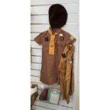 A circa 1960's Brownie uniform, 6th Luton Pack, comprising two dresses, one long sleeved the other