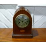 An Edwardian mahogany and inlaid Mantel Clock, the 8-day movement striking on a coiled gong, 13in (