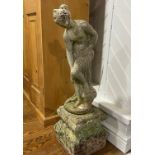 Garden Statuary; a reconstituted stone model of a Classical Beauty, raised on a plinth, 36½in (93cm)