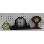 A retro Chrome Mantel Clock, with stained wood, 9in (23cm) wide x 3in (8cm) deep x 5½in (13cm) high,