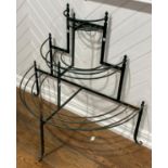 A Vintage green-painted three-tier Plant Stand, 43in (109cm) wide x 41in (104cm) high.