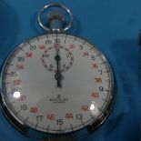 A vintage Breitling chrome Stopwatch, with white enamel dial and Arabic red and black numerals,