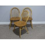 Three Ercol 'Blonde' ash and elm Windsor Chairs, with hoop and stick back, also sticker labels