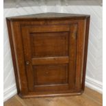 A Georgian oak corner Wall Cupboard.