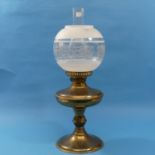 A late Victorian brass and glass Oil Lamp, with frosted and foliate glass globe, 55cm high, together