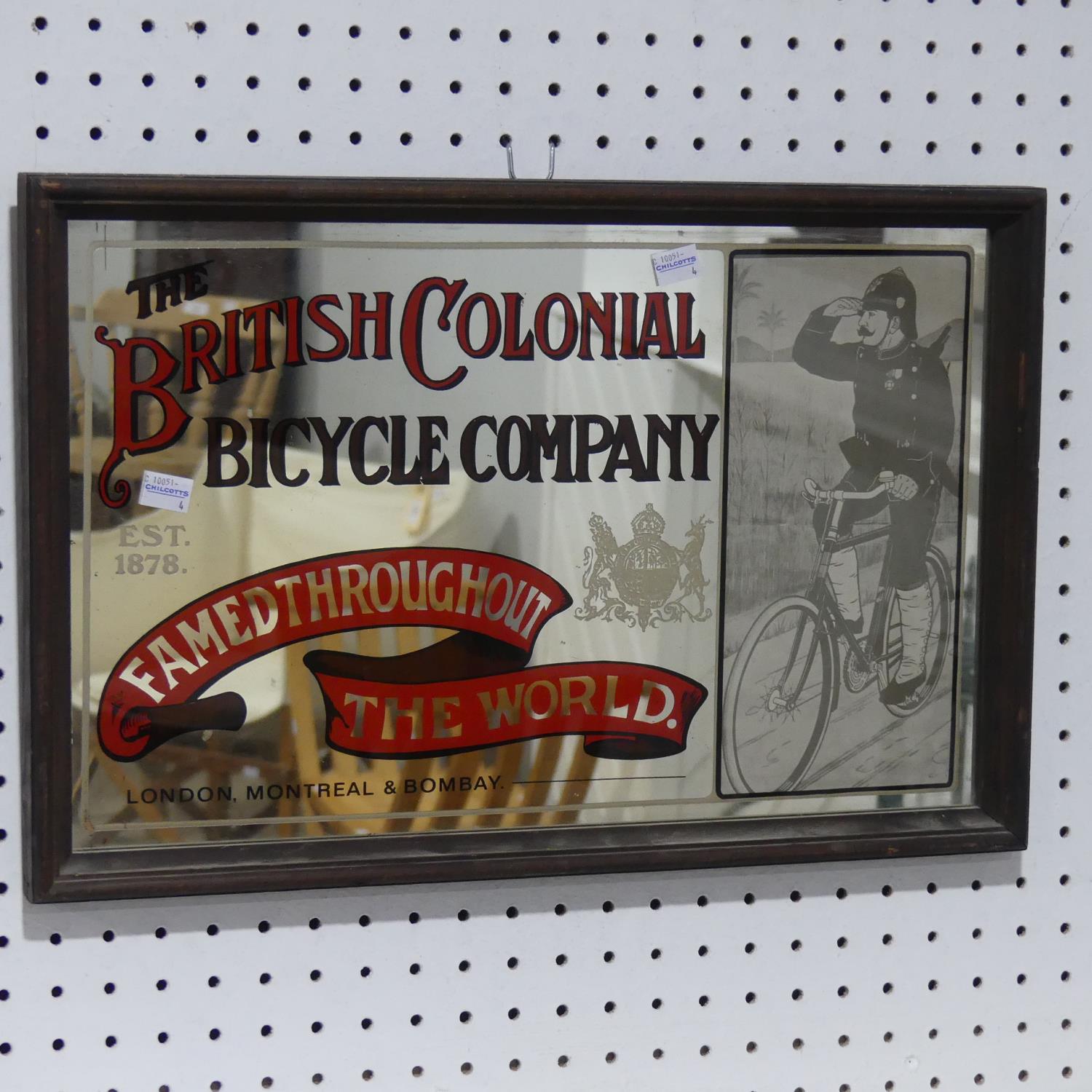 A vintage British Colonial Bicycle Company advertising Mirror, 20in (51cm) x 13in (33cm() together