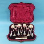 An eleven-piece silver-plated dessert serving set, in fitted leather case, together with a silver