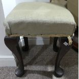 A Victorian mahogany framed Stool, with stuff-over seat raised on somewhat cabriole legs and pad