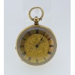 A pretty continental 18k gold open face Pocket Watch, the gilt dial with foliate engraving and black