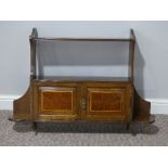 An Edwardian mahogany Wall hanging Cupboard, with shelving and enclosed compartments, 35in (89cm)