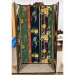 A Edwardian mahogany framed Folding Screen, the framed with moulded motifs, lined with colourful