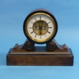 A French walnut drumhead Mantel Clock, signed Brevete Paris, the movement stamped with a bird