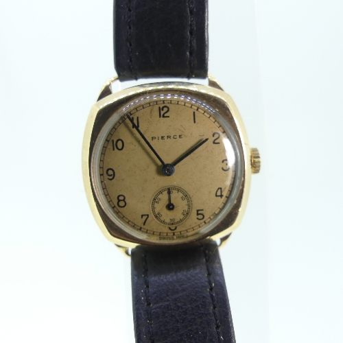 A 9ct gold Pierce gentleman's Wristwatch, with Swiss movement, the cushion-shaped case with circular