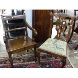 A Georgian walnut Elbow Chair, with pierced back splat above woolwork upholstered seat, 19in (