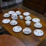 A Minton 'Marlow' pattern Tea Service, comprising six Teacups, five Saucers, six Plates, Teapot,