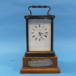 A vintage striking Carriage Clock, Mathew Norman, London, of traditional five-glass form with 11-
