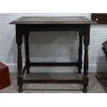 A Victorian oak Side Table, the top with incised border, raised on turned legs and box stretcher,