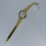 A 9ct gold Rotary lady's Wristwatch, with Swiss movement, the rounded rectangular silvered dial with
