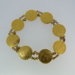 A Turkish 50 Kurush gold coin bracelet, the eight coins joined by short double row chain links,