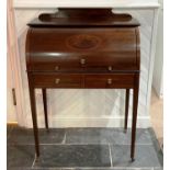 A Late Victorian mahogany roll-top Desk, with ovular inlay, leather inset and fitted interior,