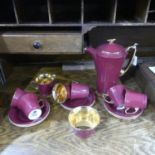 A Fieldings Crown Devon red Coffee Service, comprising six Coffee Cans, six Saucers and Coffee