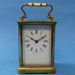 A French gilt-brass Carriage Clock, of plain five-glass form, 14cm high handle up, with carry case.