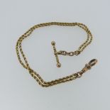 A gentleman's Watch Chain, formed of two narrow double twist chains, unmarked but tested as 15ct