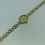 A 9ct gold Rotary lady's Wristwatch, with Swiss movement, the oval dial with raised gilt batons,