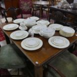 An extensive Minton 'Felicity' pattern eight place setting Dinner Service, comprising eight Side