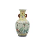 A CHINESE FAMILLE ROSE 'BLOSSOMS' VASE.