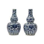 A PAIR OF CHINESE BLUE AND WHITE 'DOUBLE GOURD' VASES.