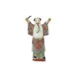 A CHINESE FAMILLE ROSE FIGURE OF AN IMMORTAL.