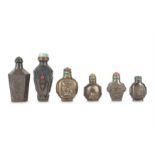 SIX CHINESE WHITE METAL SNUFF BOTTLES.