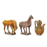 TWO CHINESE POTTERY FIGURES OF HORSES.