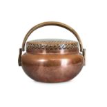 A LARGE CHINESE COPPER ALLOY HANDWARMER AND COVER.