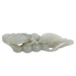 A CHINESE PALE CELADON JADE 'BIRD AND LINGZHI' CARVING.