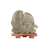 A CHINESE PALE CELADON JADE 'DOUBLE FISH' CARVING.