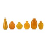 SIX CHINESE YELLOW GLASS SNUFF BOTTLES.