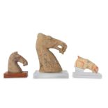 THREE CHINESE POTTERY HORSEHEADS.