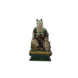 A CHINESE FAMILLE VERTE SANCAI FIGURE OF AN IMMORTAL.