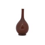 A CHINESE RED-GLAZED BOTTLE VASE.