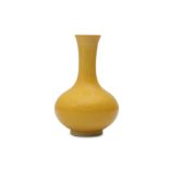 A CHINESE LEMON YELLOW-GLAZED 'DRAGON' BOTTLE VASE.