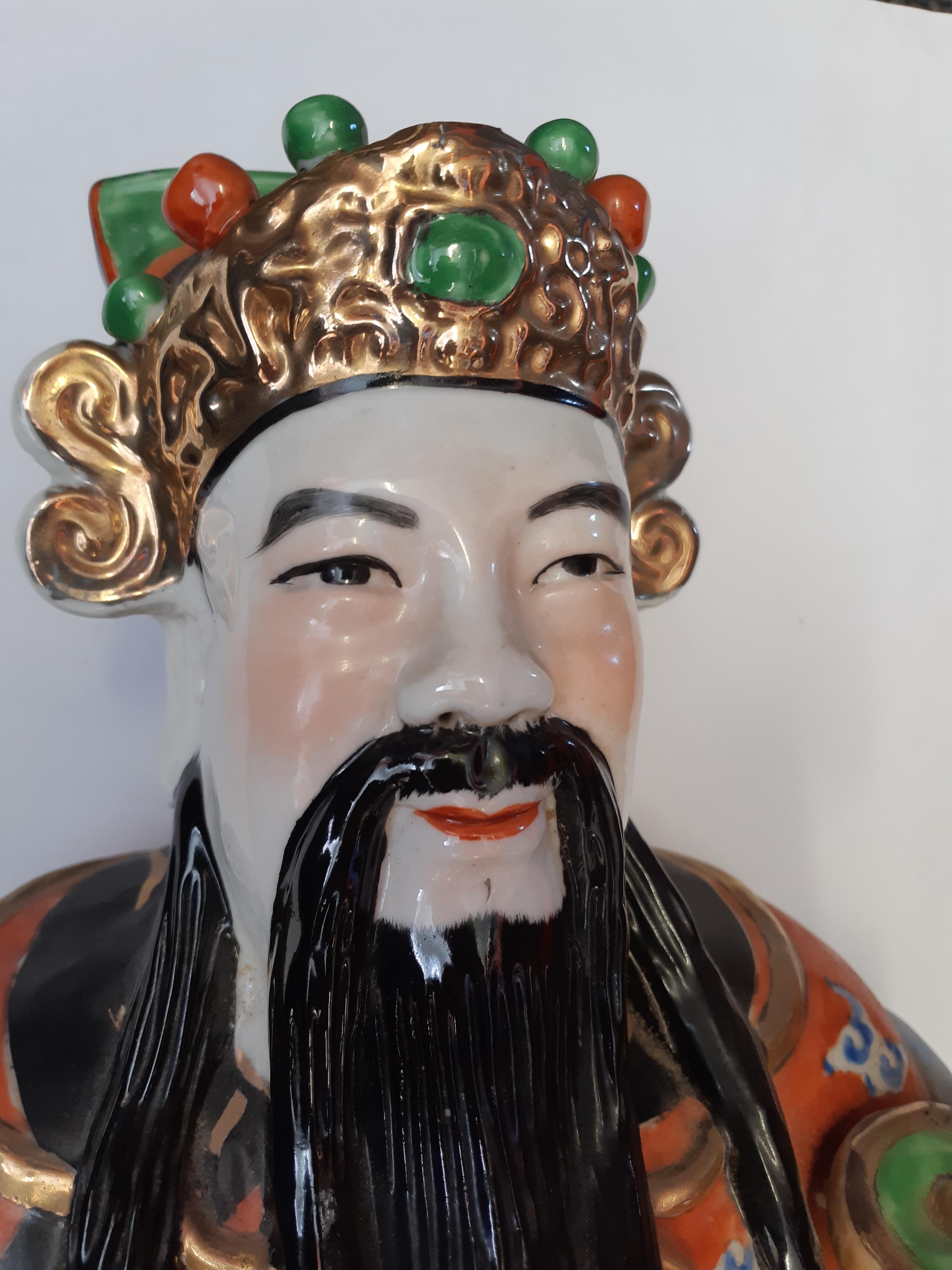 A CHINESE FAMILLE ROSE FIGURE OF AN IMMORTAL. - Image 7 of 9