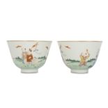 A PAIR OF CHINESE FAMILLE ROSE 'NEW YEAR' CUPS.