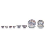 TWO SETS OF CHINESE AND JAPANESE IMARI CUPS AND SAUCERS.