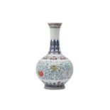 A CHINESE DOUCAI 'LOTUS' BOTTLE VASE.