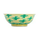 A CHINESE YELLOW-GROUND GREEN 'CLOUD' BOWL.