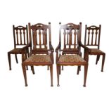JAS. SHOOLBRED & CO, A SET OF SIX ARTS & CRAFTS OAK DINING CHAIRS RETAILED AT LIBERTY'S