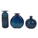 UNKNOWN: Three blue glass vases