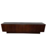 UNKNOWN: A LARGE MID CENTURY STYLE INDIAN ROSEWOOD VENEER CREDENZA, CIRCA 2000S,